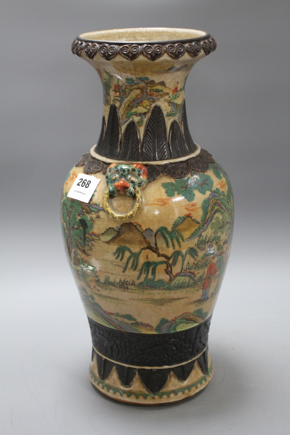 A late 19th century Chinese crackle glaze vase, decorated with figures in a continuous landscape, height 46cm
